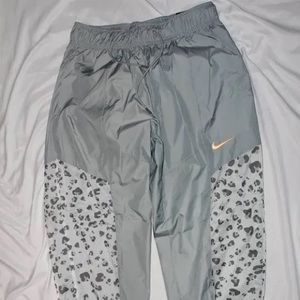 NWT Size L Nike Pants - Nike Sportswear Womens Leopard Print Windbreaker Pants